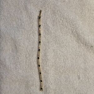 Elegant Gold and Black Bracelet